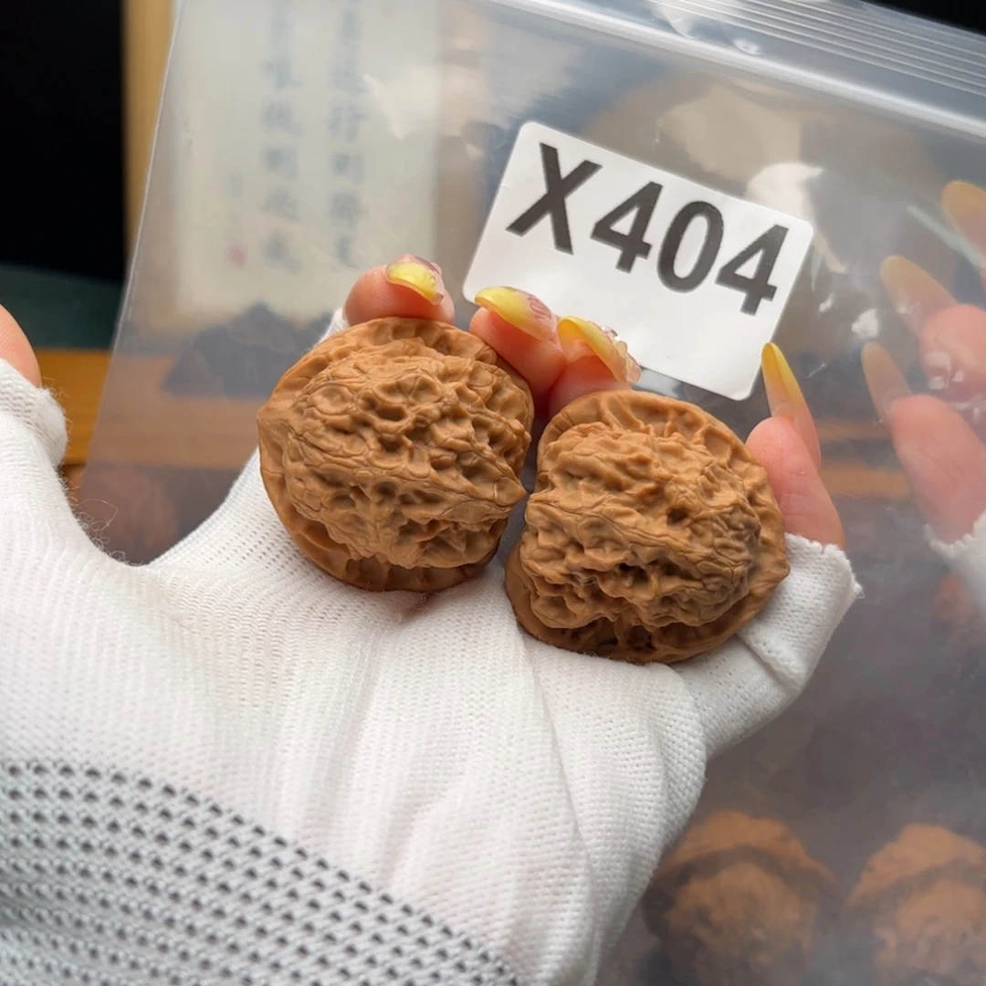 桃核把件38左右梨木台x404