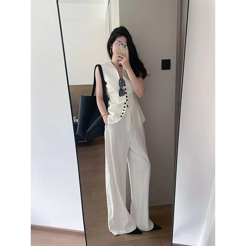 夏季时尚简约高级感无袖马甲套装女2025单排扣棉麻背心长裤两件套