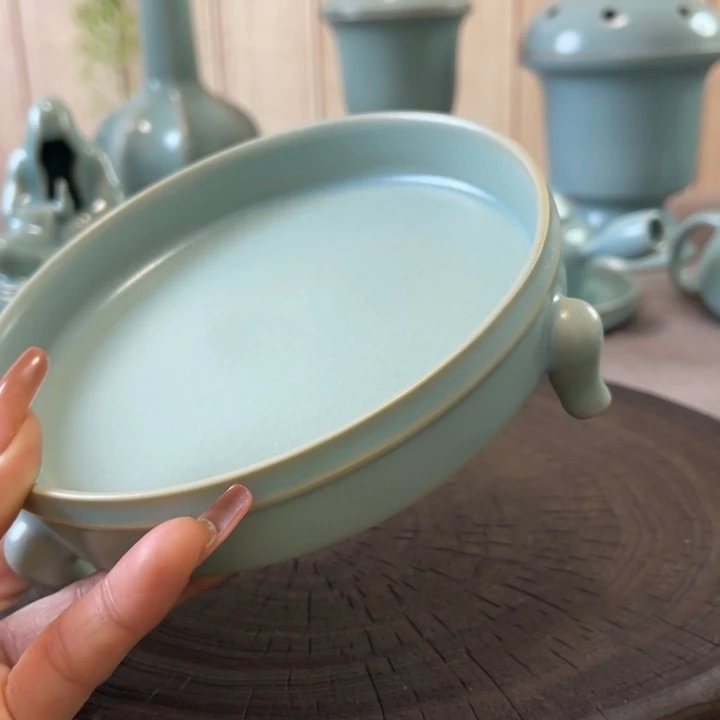 瓷片三足洗一一一一一瑕