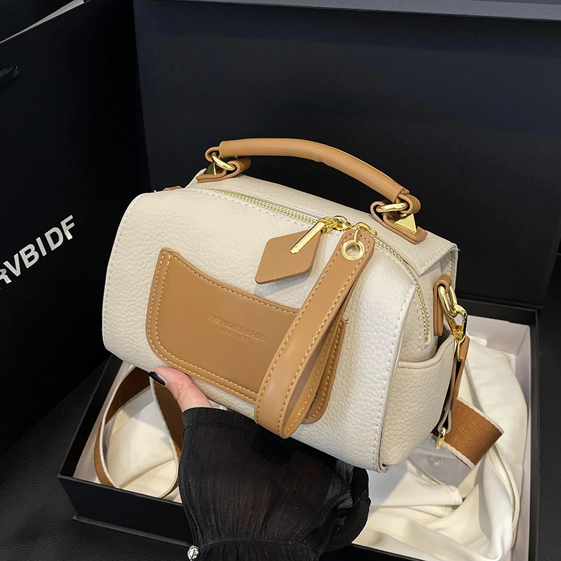 秋冬新款撞色宽肩带时尚手提枕头包斜挎包百搭复古小众女士包