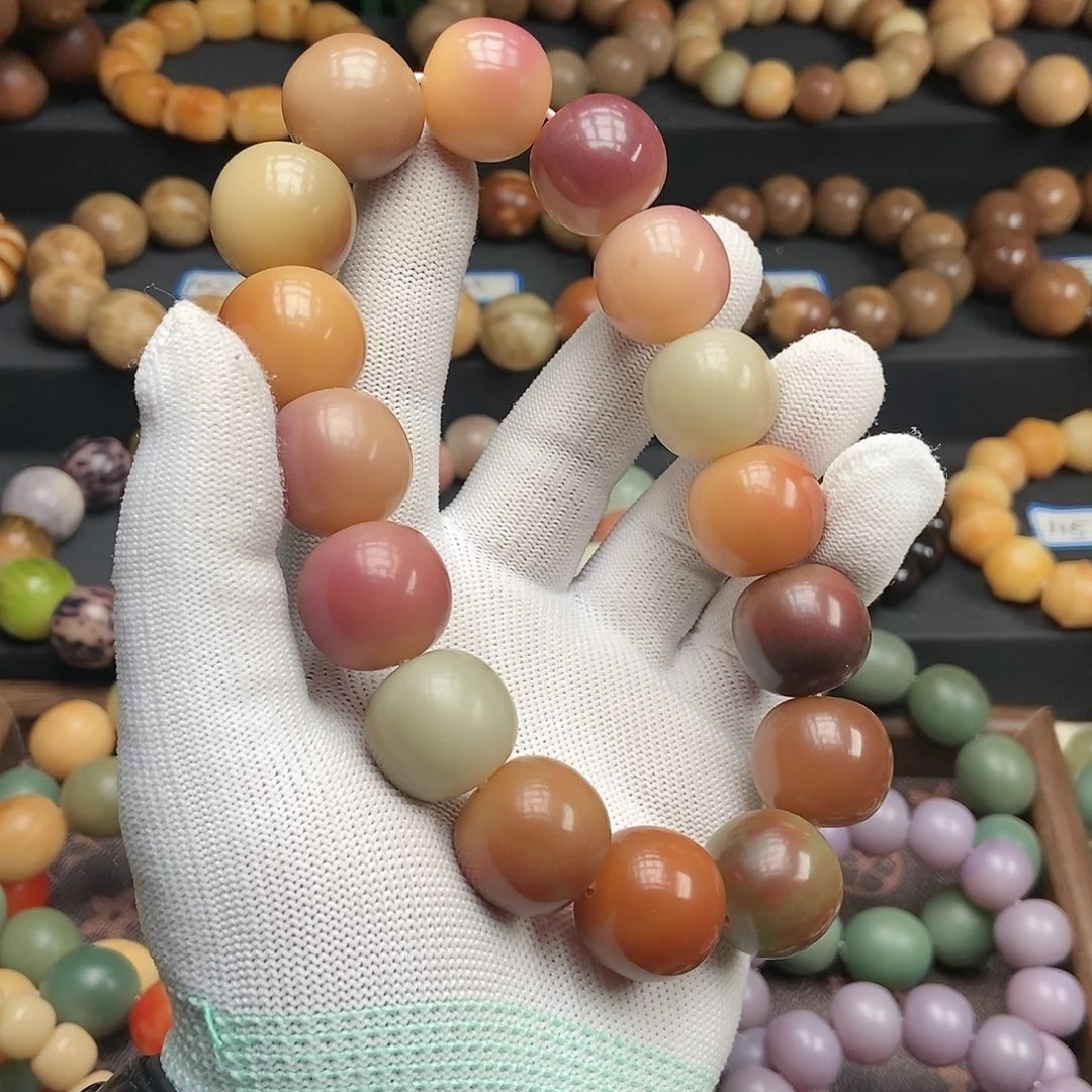 菩提根/象牙果吊坠微瑕21mm紫葡萄手持