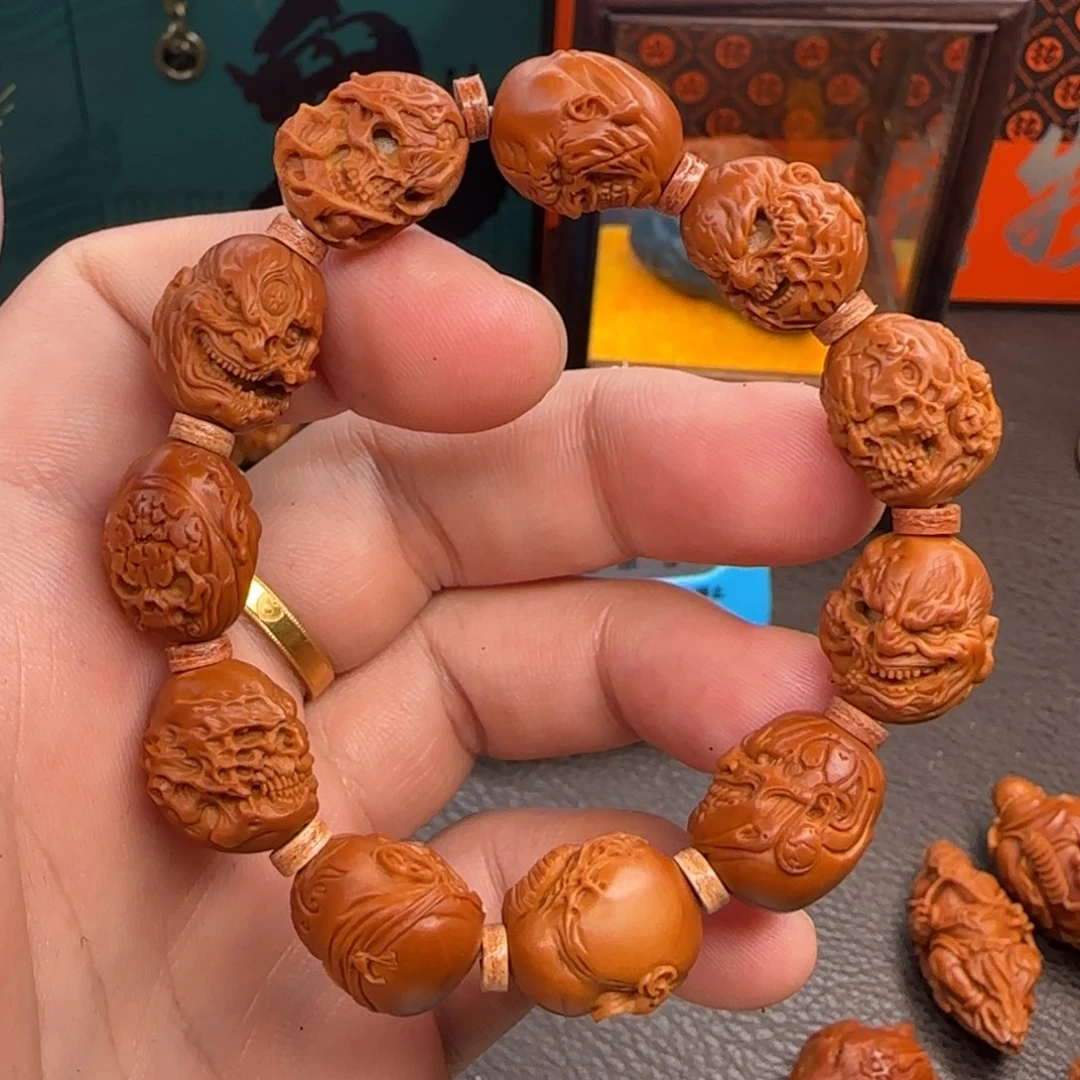 —***X橄榄核把件谢腾向死