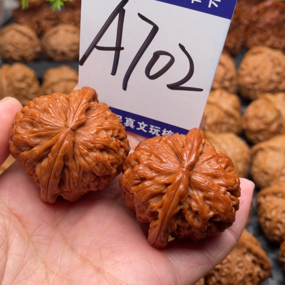 回***方桃核把件文玩核桃