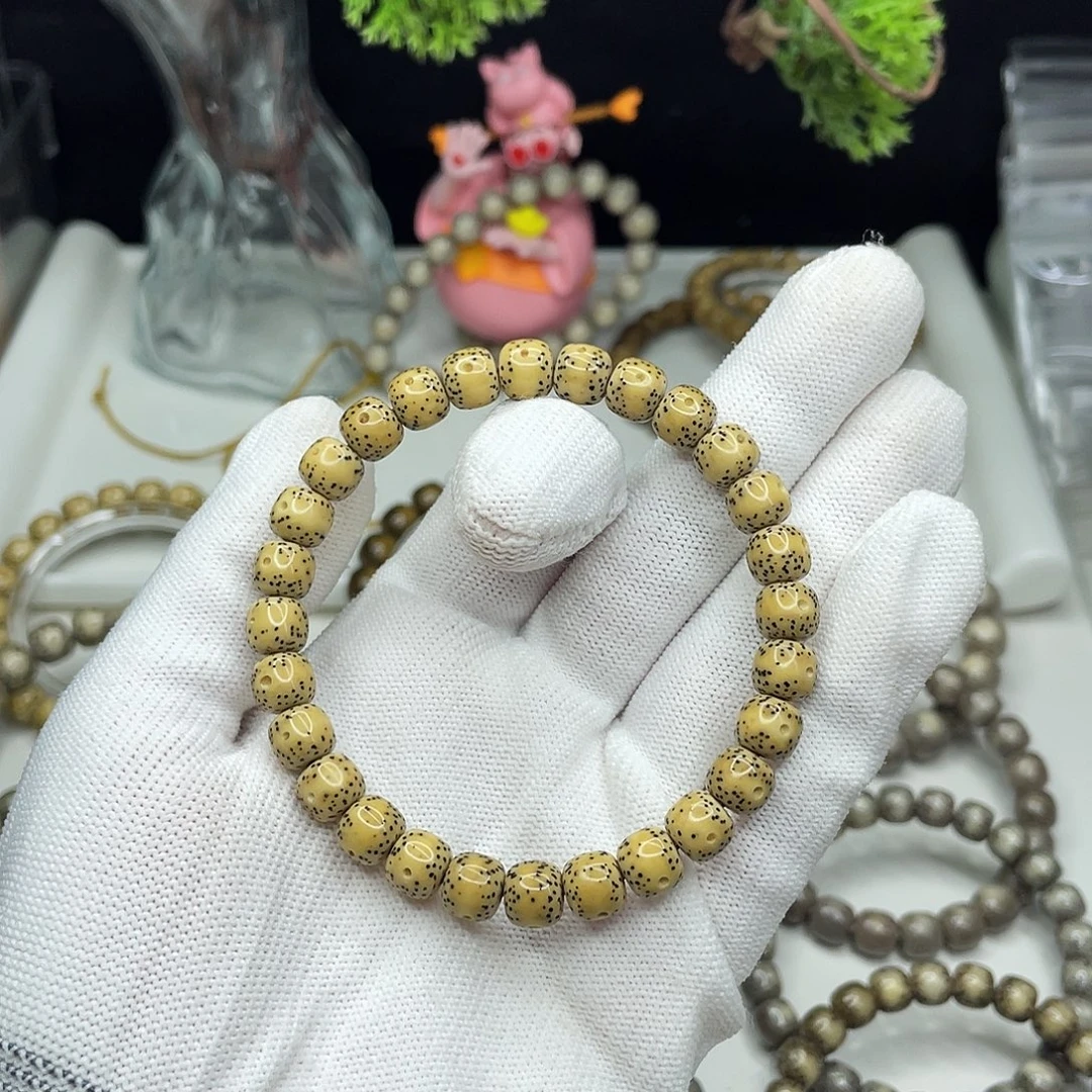 芳***娘手串星月菩提8mm 鸡油黄通体