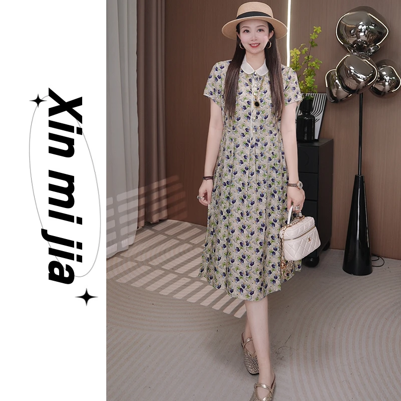 今年流行短袖娃娃领连衣裙女2026夏季新款轻奢高级感减龄印花裙子