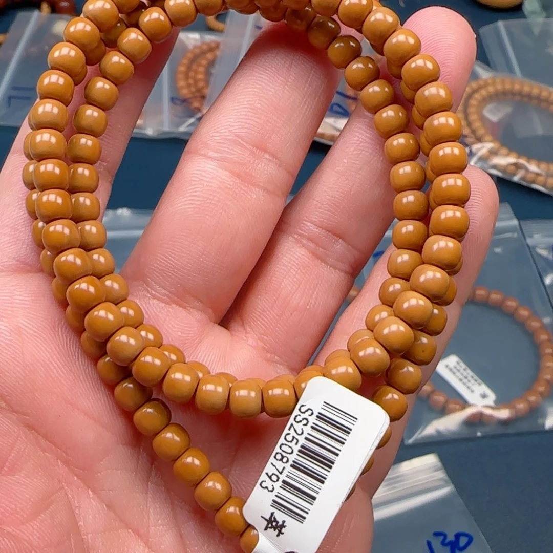 M***z橄榄核手串老挝SS级核尖极限弧尺寸5.9×130颗全无白