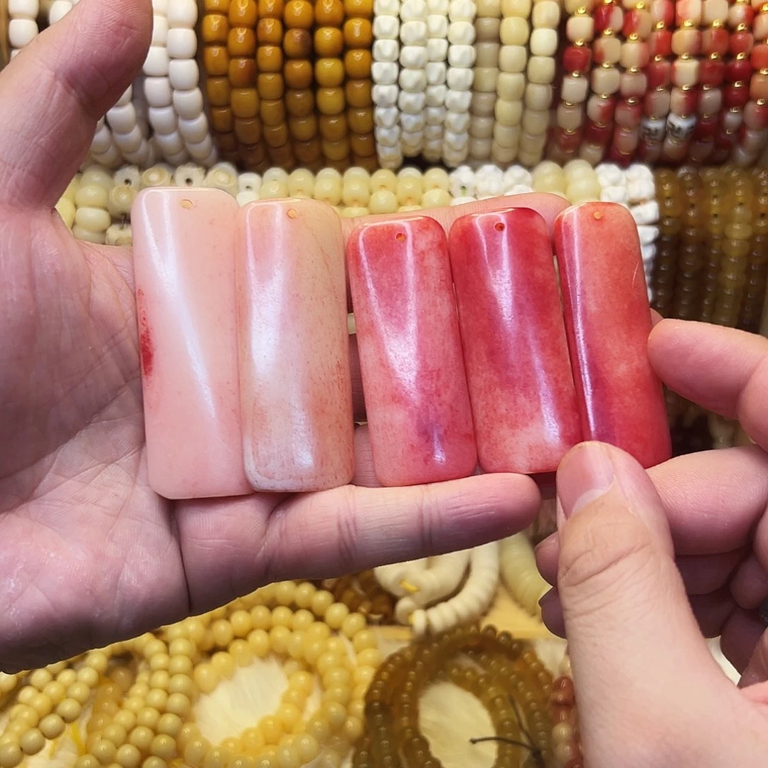 桃核把件驼骨血料无事牌