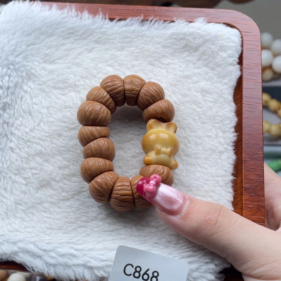 菩提根/象牙果吊坠WC868凤羽手捻16mm一串随机