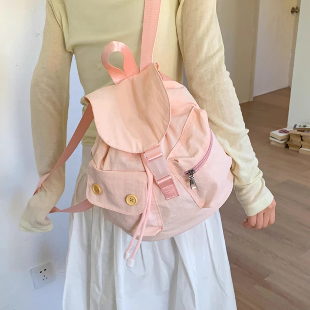 韩国小众设计口袋纽扣抽绳双肩包tensedance同款尼龙背包户外休闲