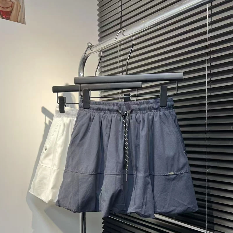 911花苞短裙 松紧抽绳A字半身裙白搭