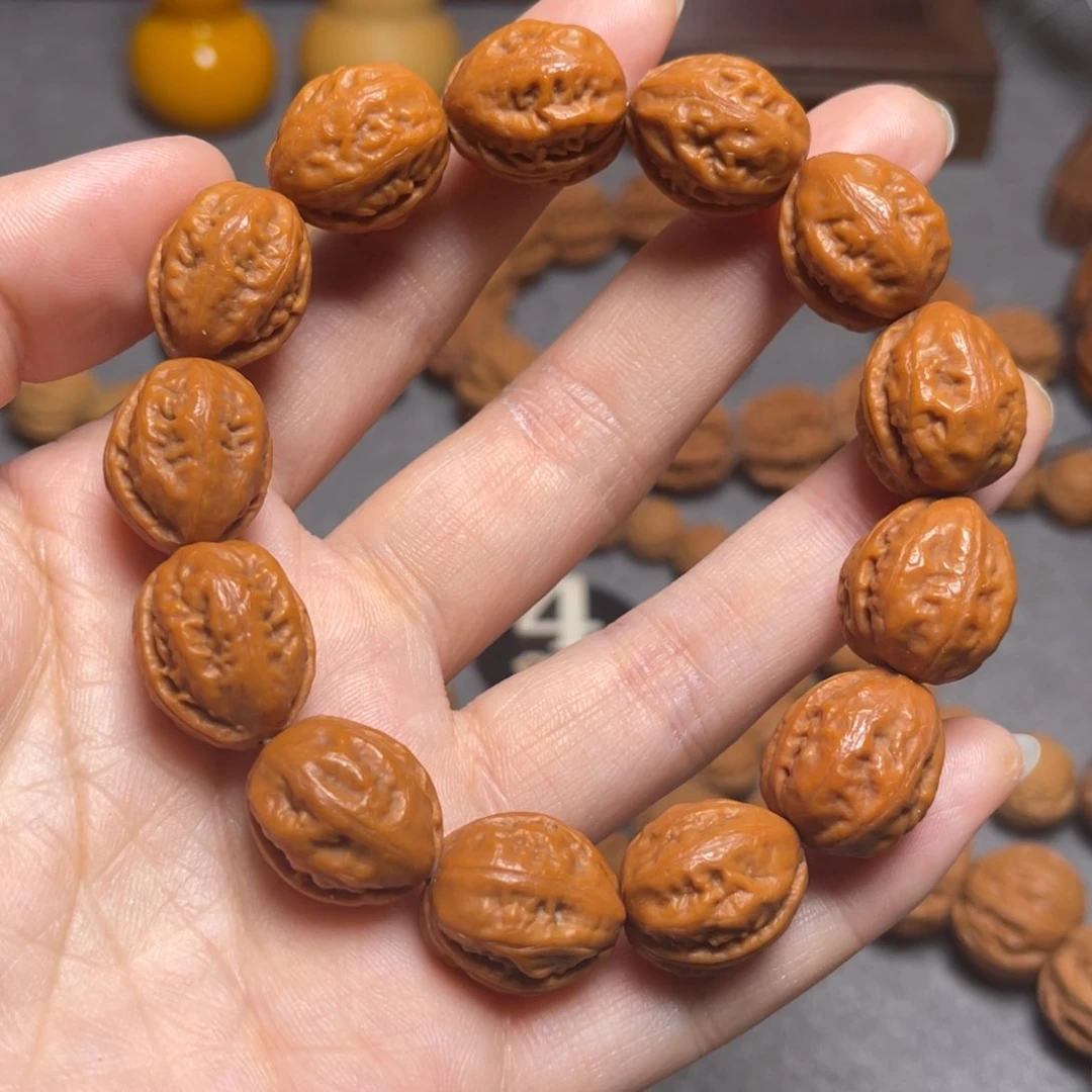 核桃M**J小粗筋瓜子手持88