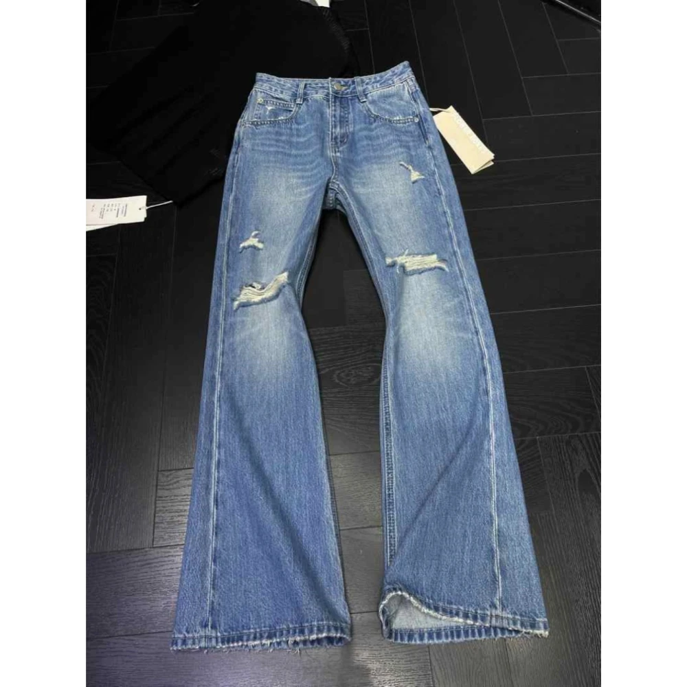 大码美式复古磨破洞微喇牛仔裤女2025冬季新款显瘦显腿长喇叭裤子