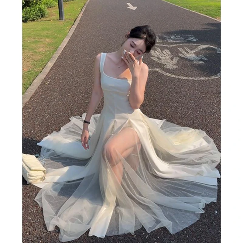 【圆舞曲】收腰显瘦网纱拼接蓬蓬仙女裙高级法式白色a字吊带连衣裙
