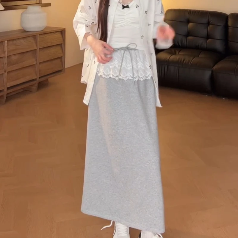 春季蕾丝钩花拼接松紧腰韩版中长A字包臀半身裙LK2501881