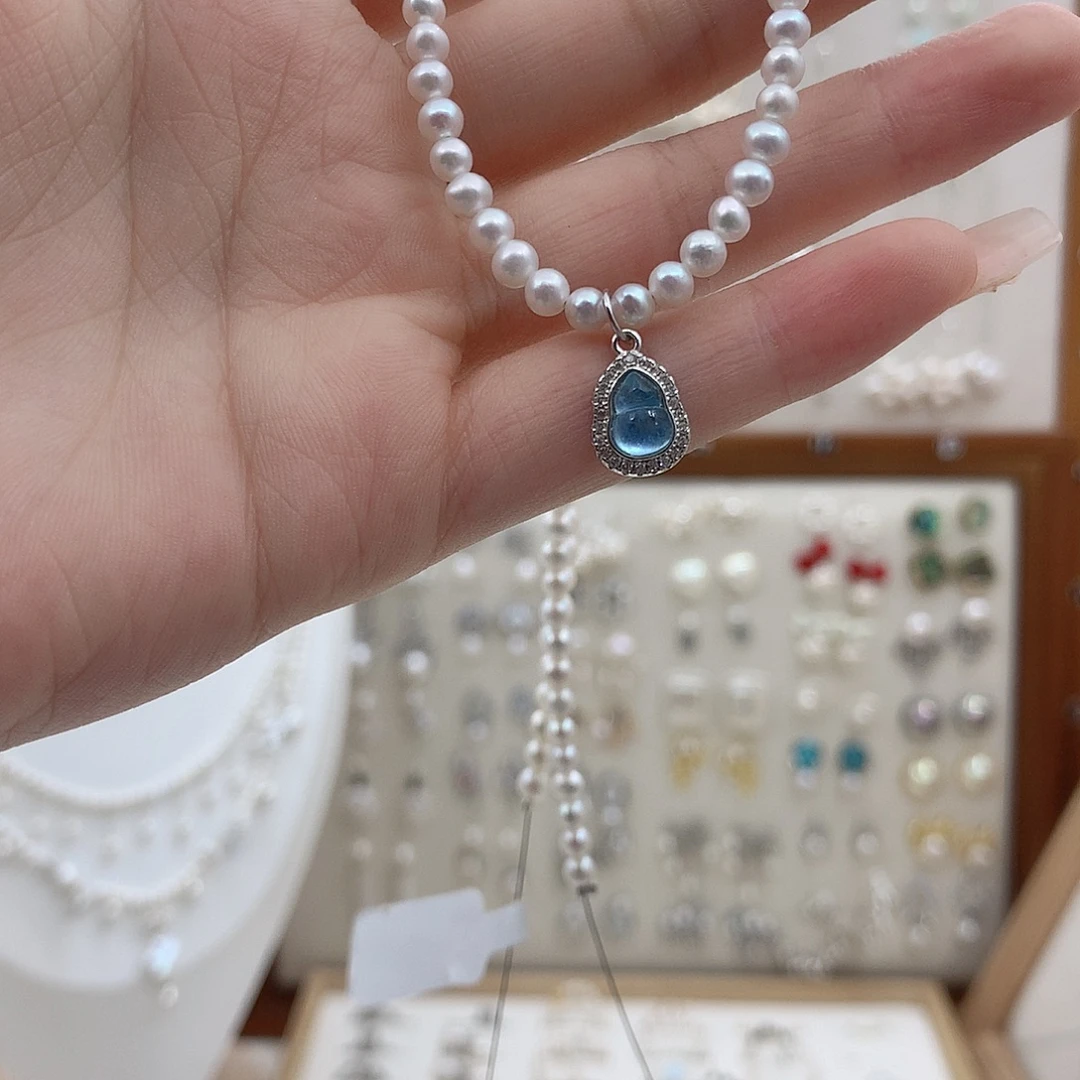 淡水珍珠银S925镶嵌耳饰