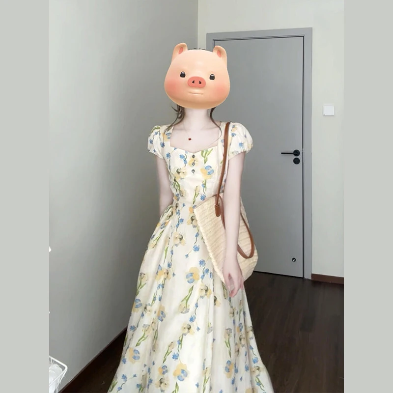 茶歇系法式郁金香泡泡袖连衣裙女夏季高级感气质收腰独特漂亮裙子