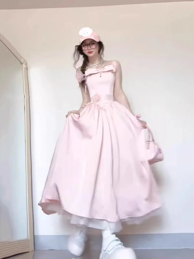 富家千金甜美粉色吊带连衣裙女夏季设计感蝴蝶结公主裙收腰长裙子