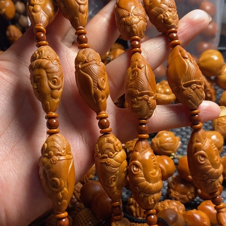 橄榄核吊坠鲁****_柳叶观音脖挂