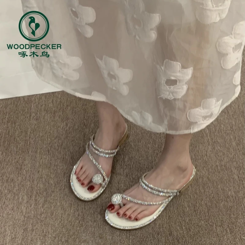 啄木鸟法式水钻凉拖鞋女夏外穿2025新款仙女风夹脚一字拖沙滩凉鞋