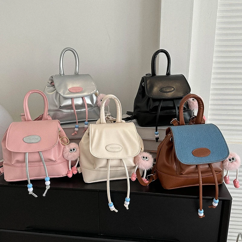 复古学院风双肩包包女2025秋冬新款韩国撞色背包百搭手提水桶包潮