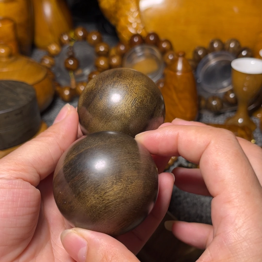 意***境金丝楠阴沉木保健球