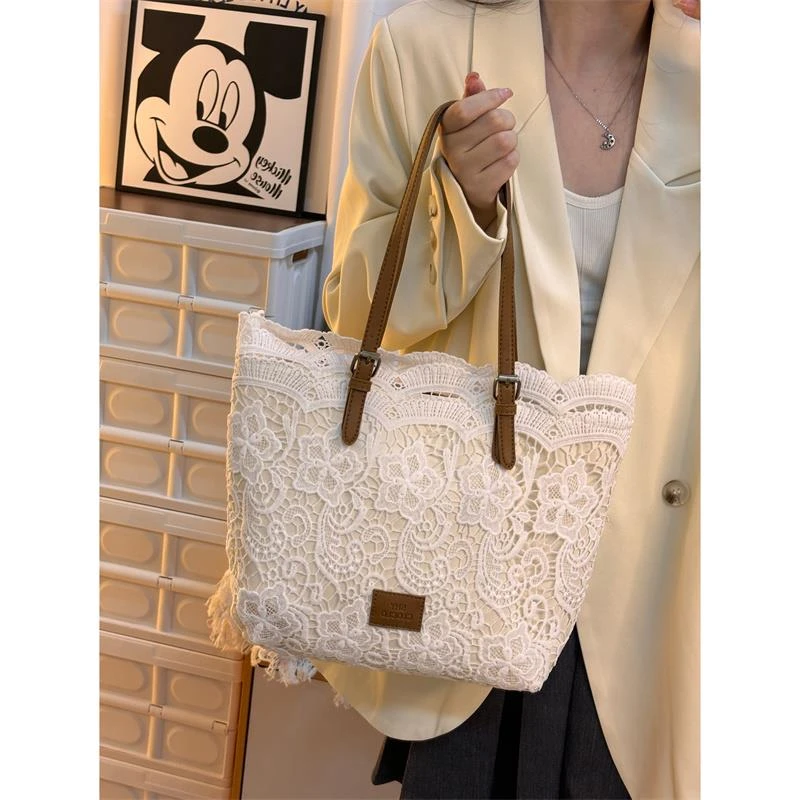 包包女2024新款大容量法式休闲手提单肩包韩版简约百搭腋下水桶包