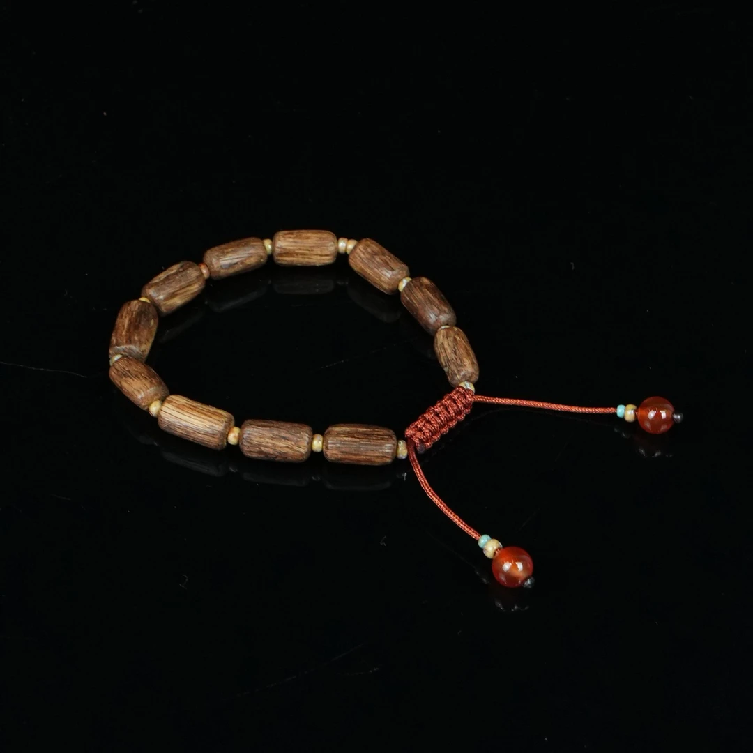 4046巴布亚沉香高山老料花香规整桶珠3g