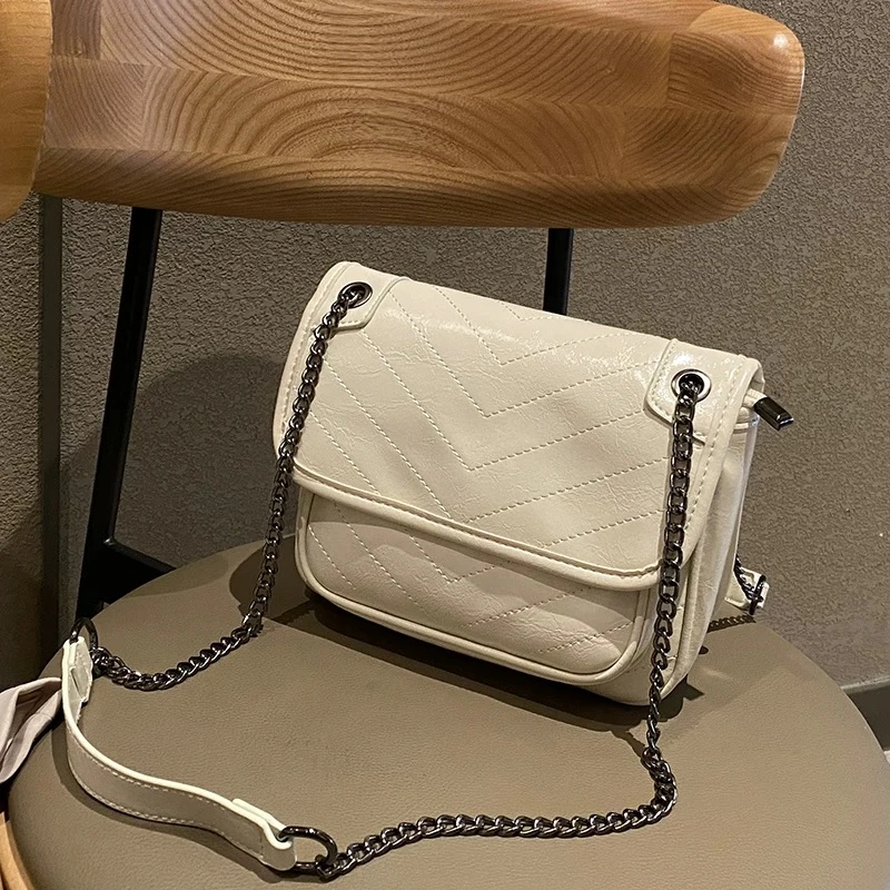 NK371 白色2025新款时尚单肩斜跨流浪包