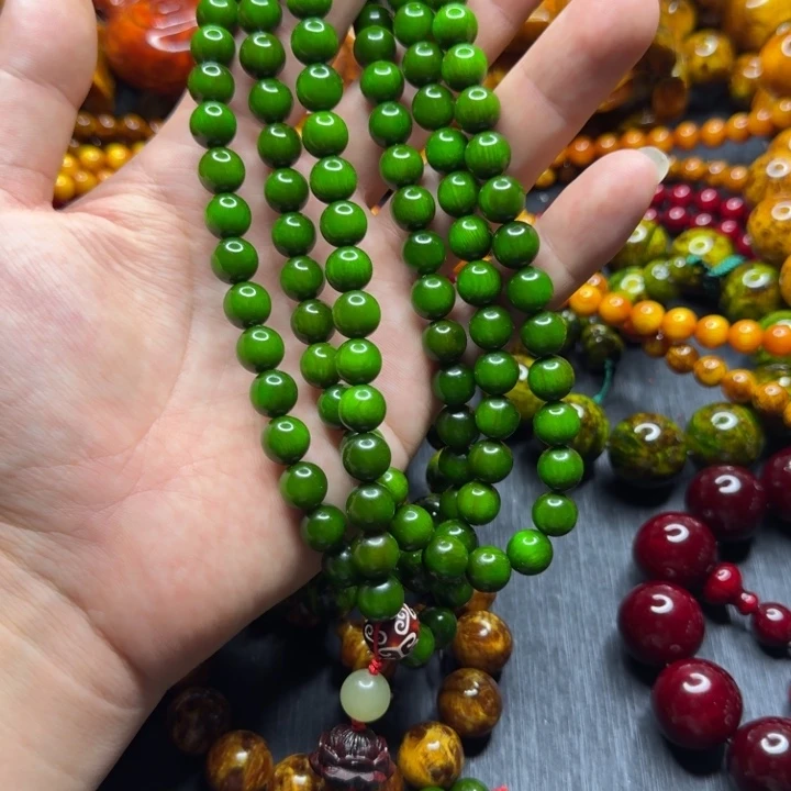 松木叶**尘琥珀木文玩手串