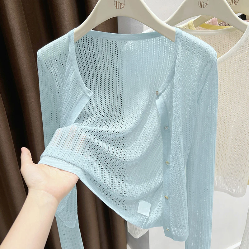 蓝色洋气长袖单排扣镂空开衫女秋季新款圆领配裙子针织防晒小披肩