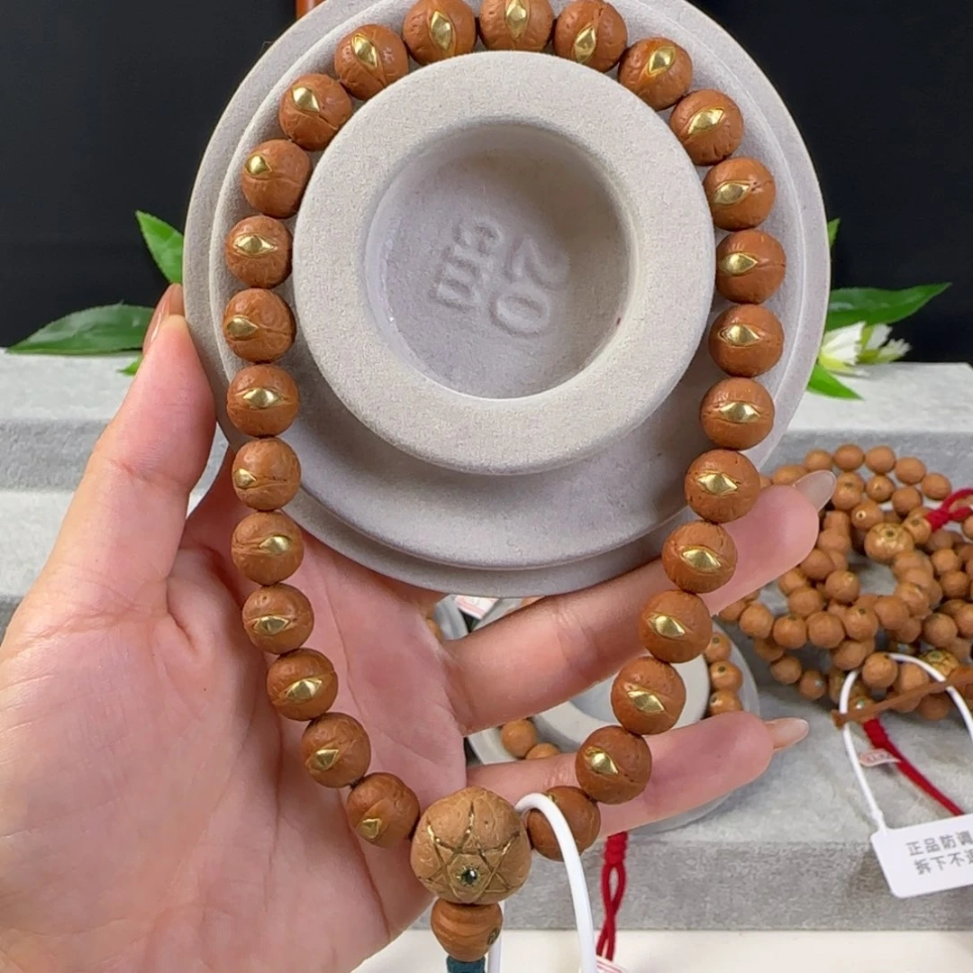 凤眼菩提手串11+铜钉慈悲眼手持