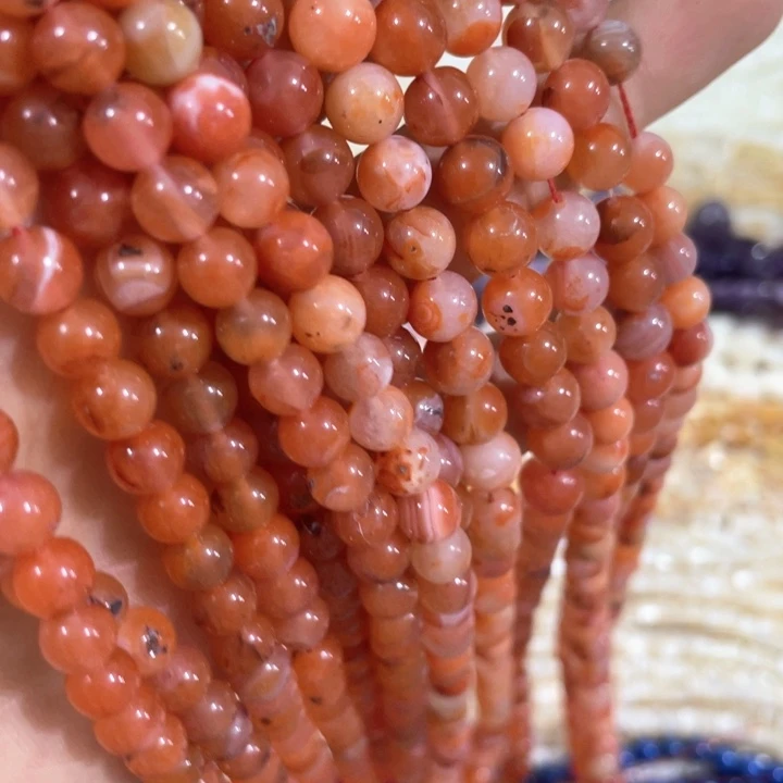 贝壳非金属一条7mm南红圆珠有瑕