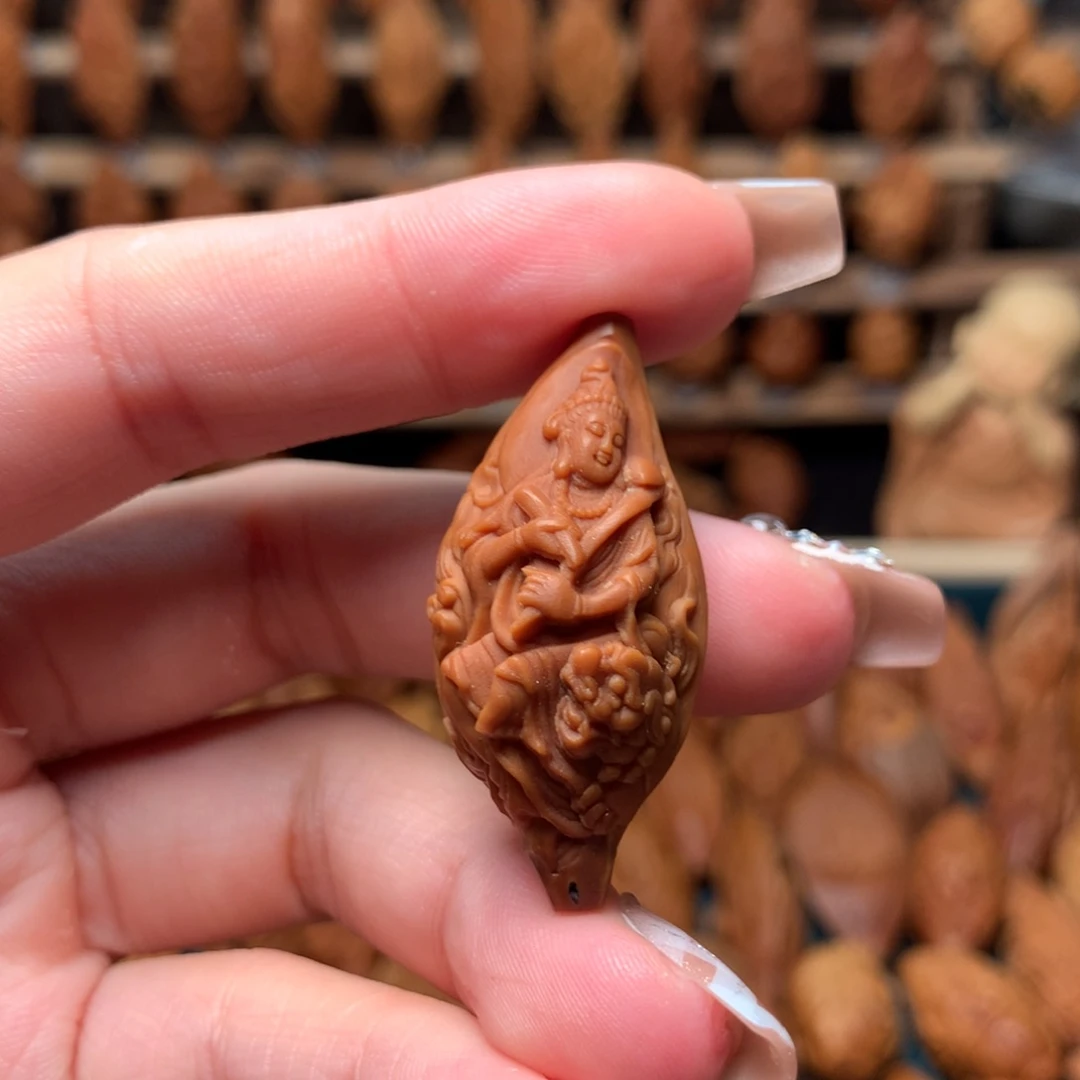 橄榄核把件文殊菩萨
