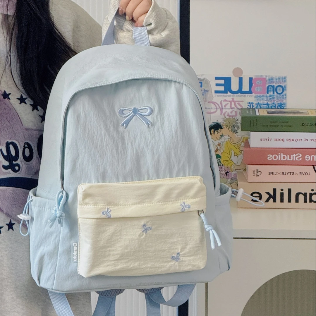 青春蝴蝶结初中女少女学院风高颜值书包双肩包大容量大学生背包