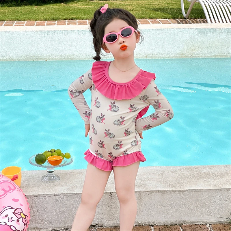 女童连体泳衣夏季新款儿童长袖速干游泳衣女宝宝卡通漏背度假泳装