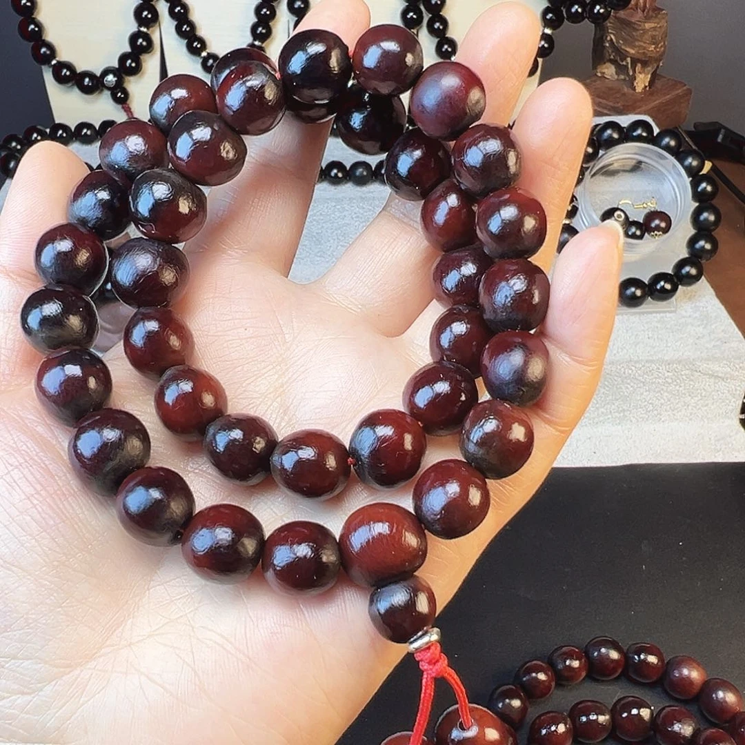 我***周精品手持卡14.5毫米36颗籽红色