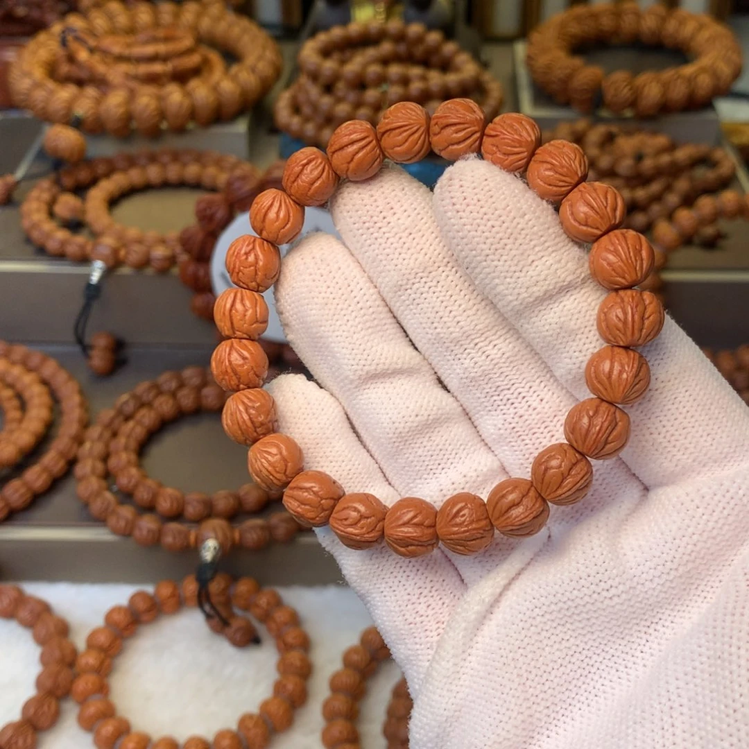 细***狗桃核手串秦岭龙纹