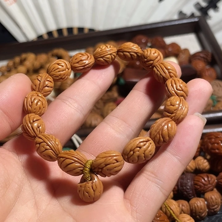 抖***霸碧桃核肌肉钱袋手串