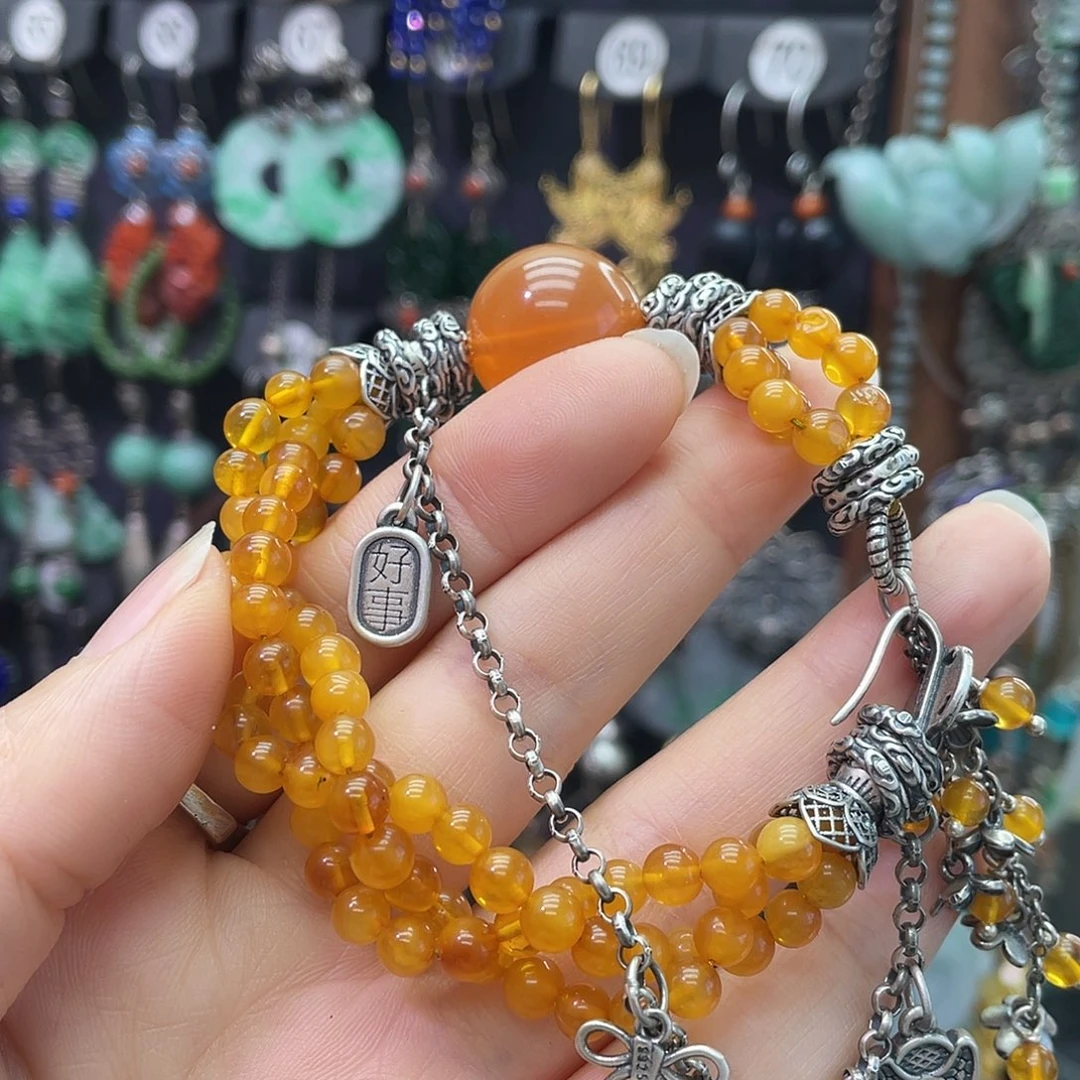 A***寻琥珀银S925镶嵌耳饰963hbbh