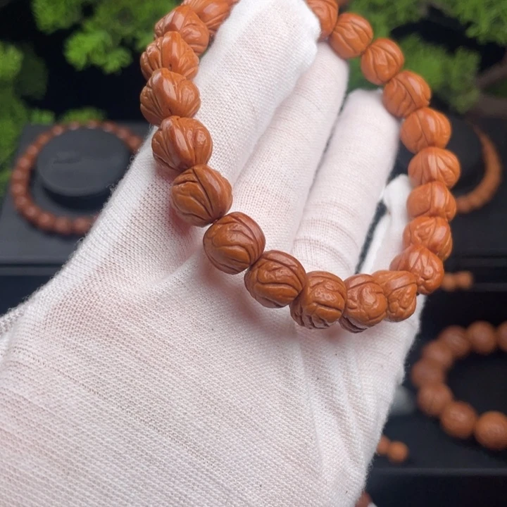 李***劲吊坠桃核精品单圈