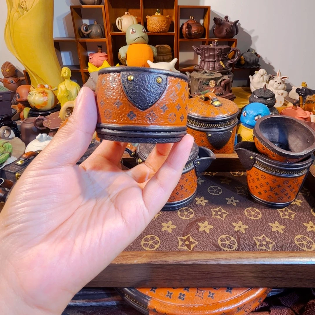 X***旭紫砂茶叶盒纯手工制作的一家