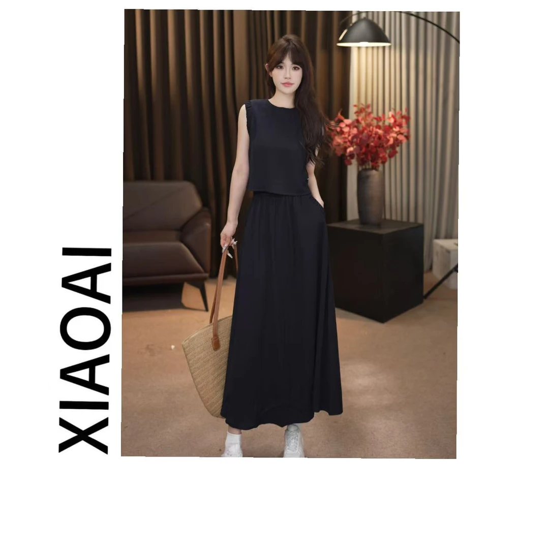 F100小艾2025初夏新款高级显瘦气质高级马甲+半身裙套装