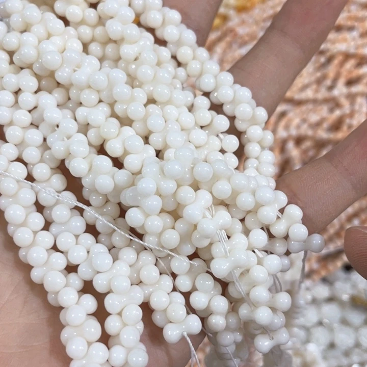 贝壳非金属一条白原枝花生珠22厘米