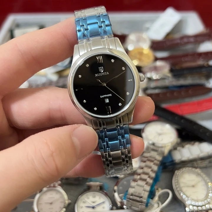 l***o钢牛皮（革）钢石英机芯