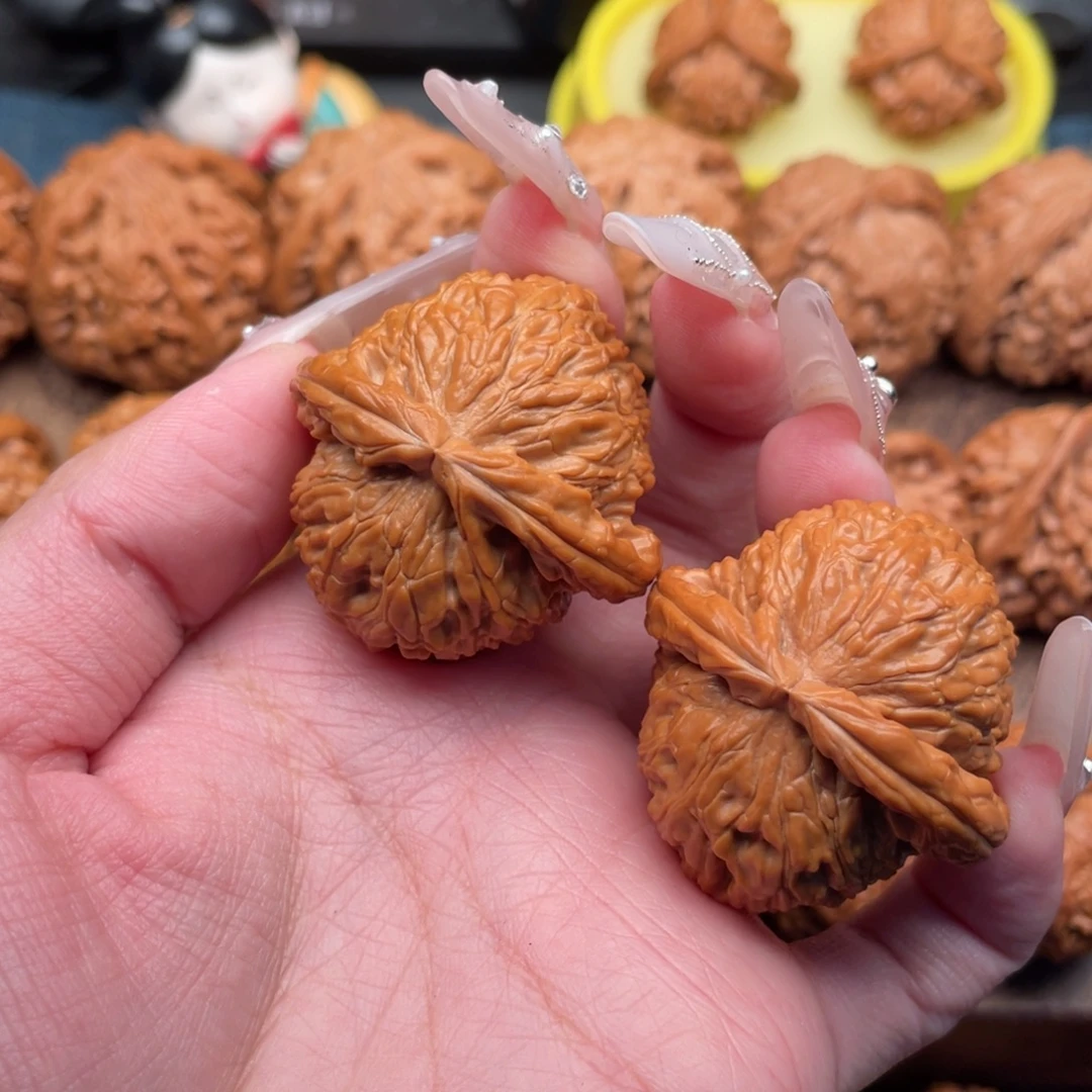 文玩核桃把件全品精配红皮球白39