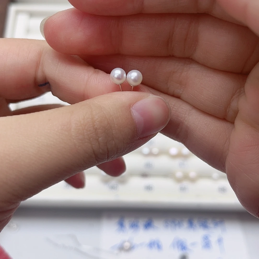 淡水珍珠耳饰银S925镶嵌希****?