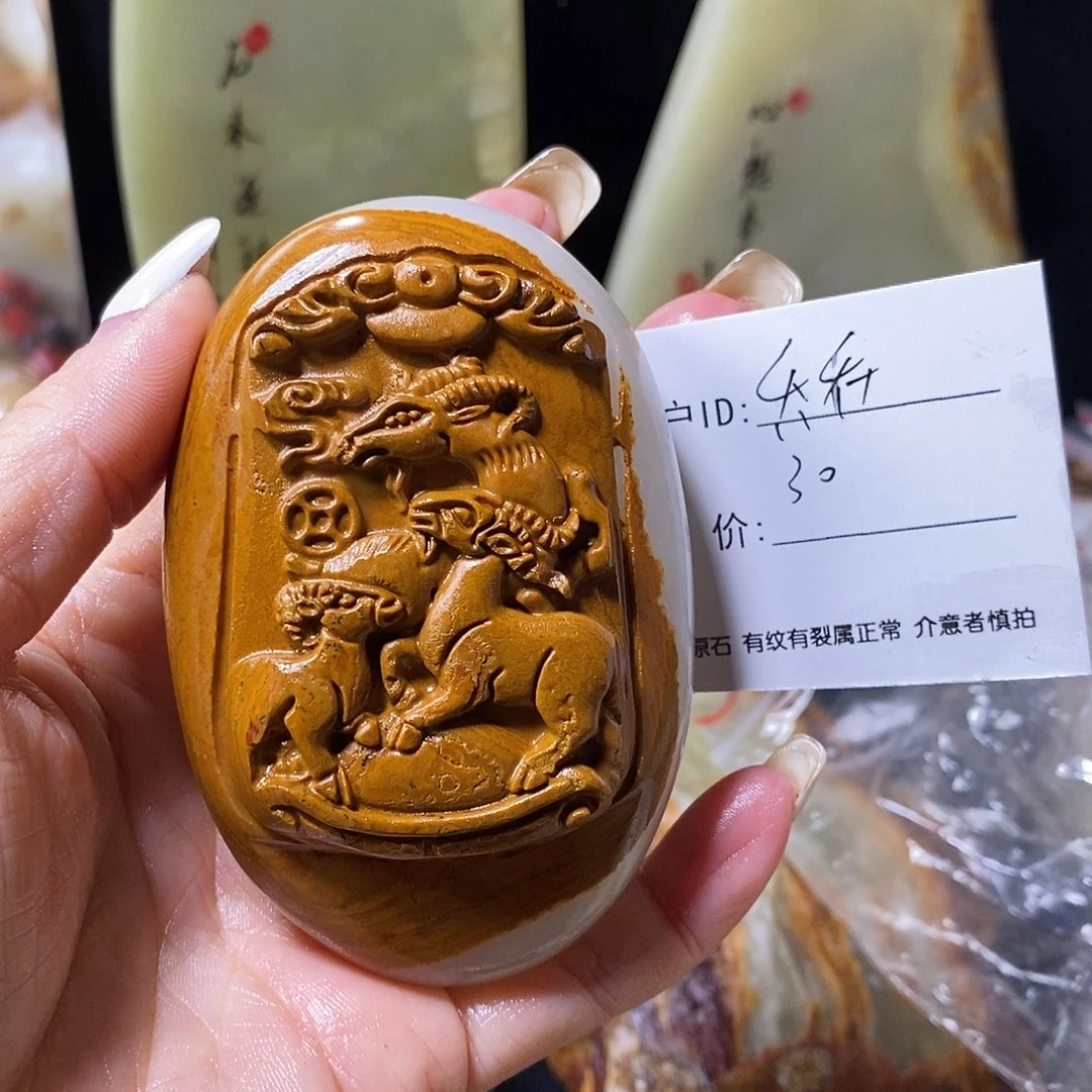 石材乔***人古青石手把件
