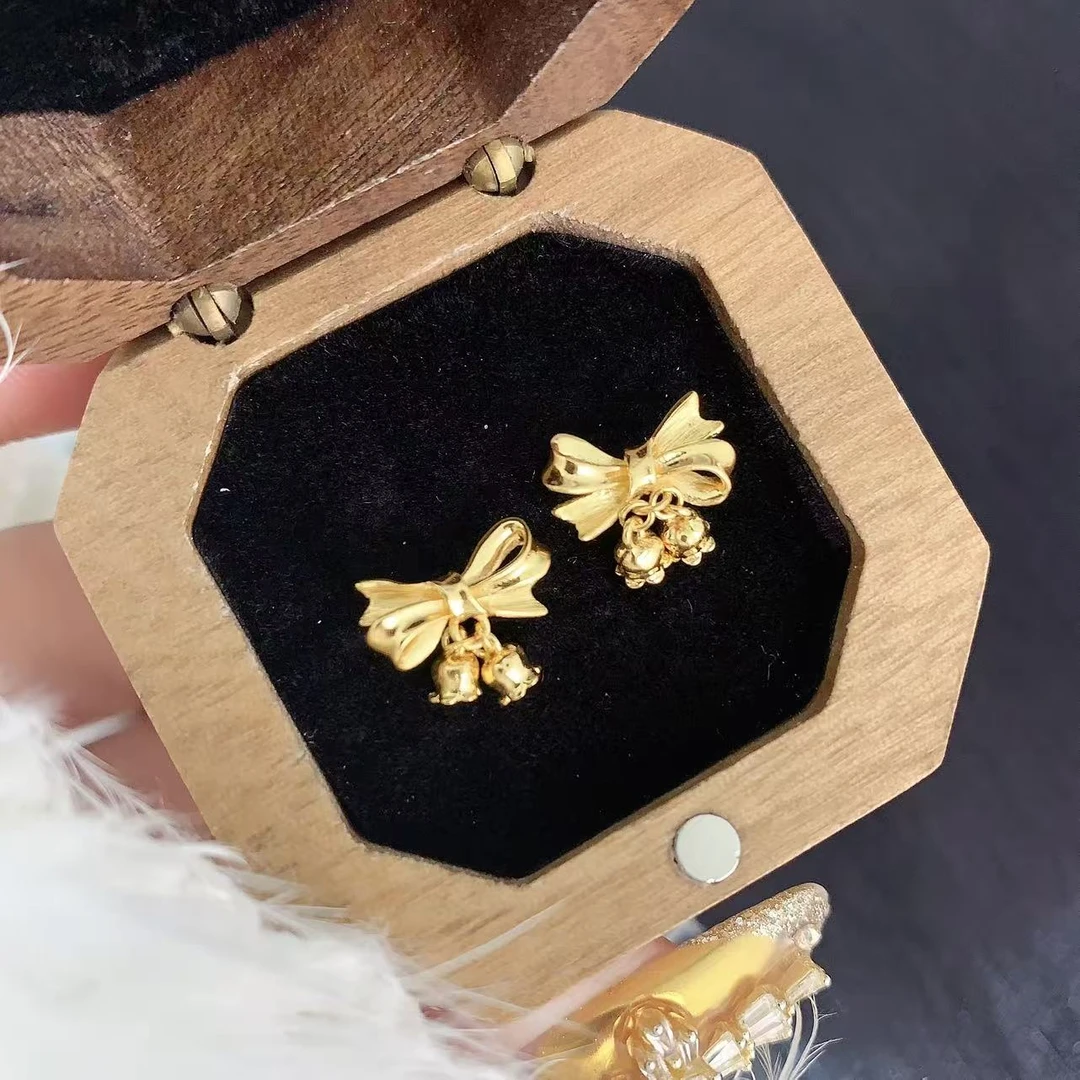 【伟新源】足金999 5G工艺   蝴蝶结铃兰弯钩2.7克