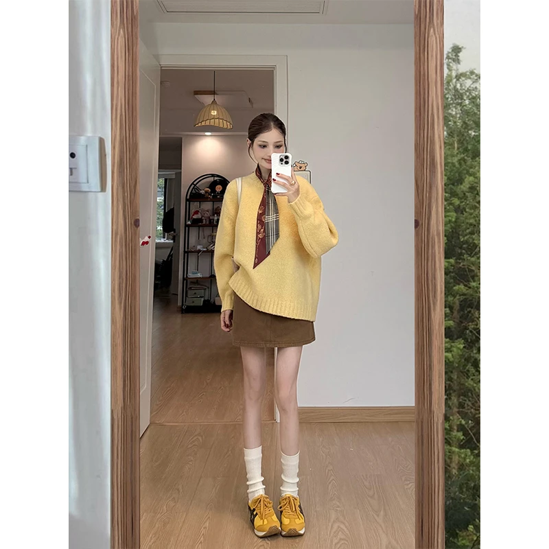 2025秋季新款今年流行超好看慵懒风黄色针织上衣半身裙两件套装女