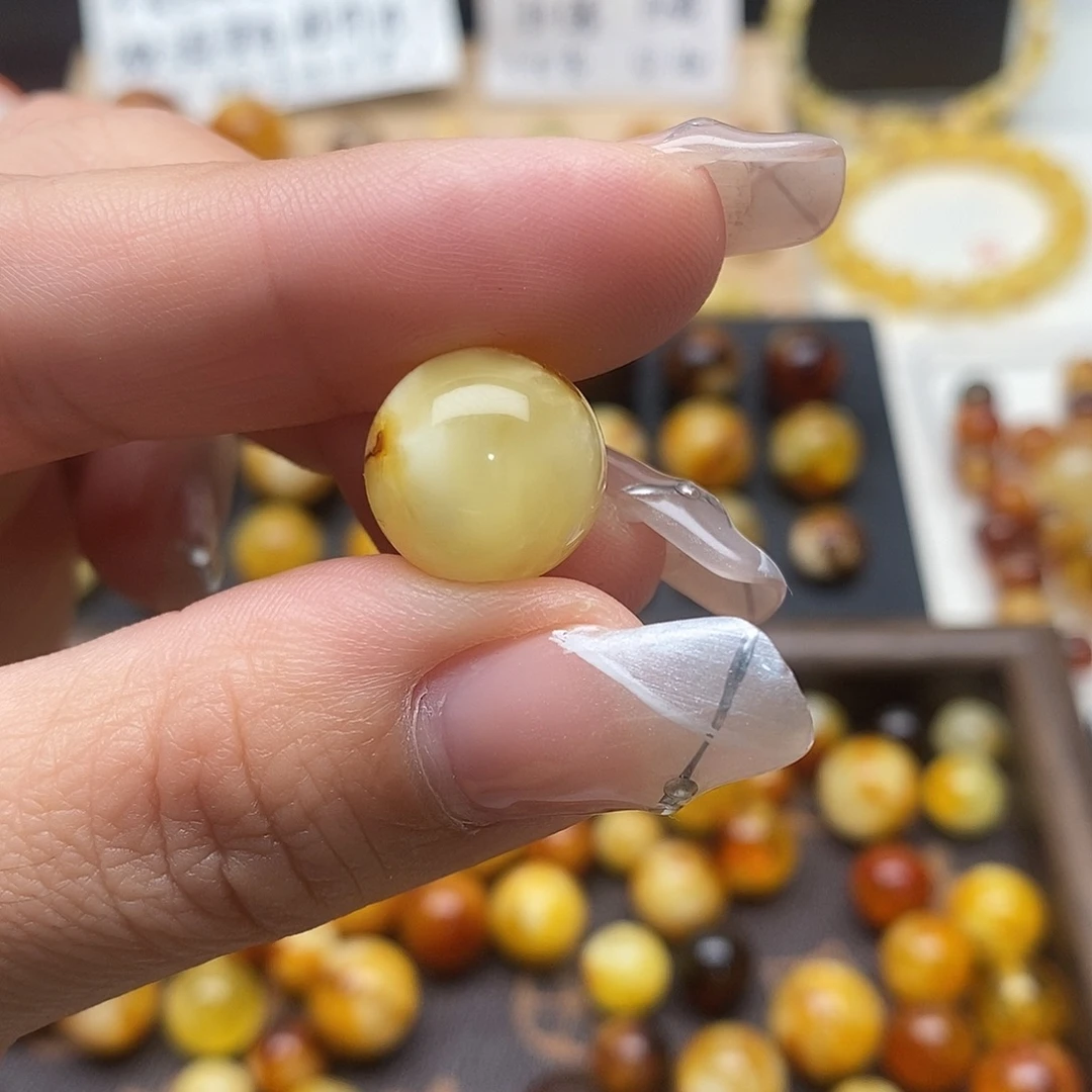 沙***豹虫珀未镶嵌裸石蜜蜡
